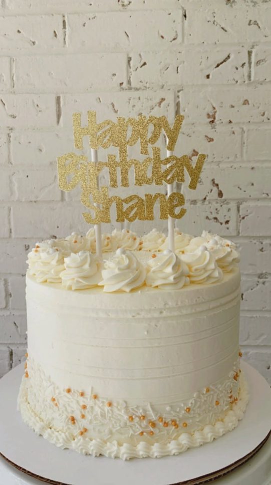 A vanilla cake with toasted nuts
